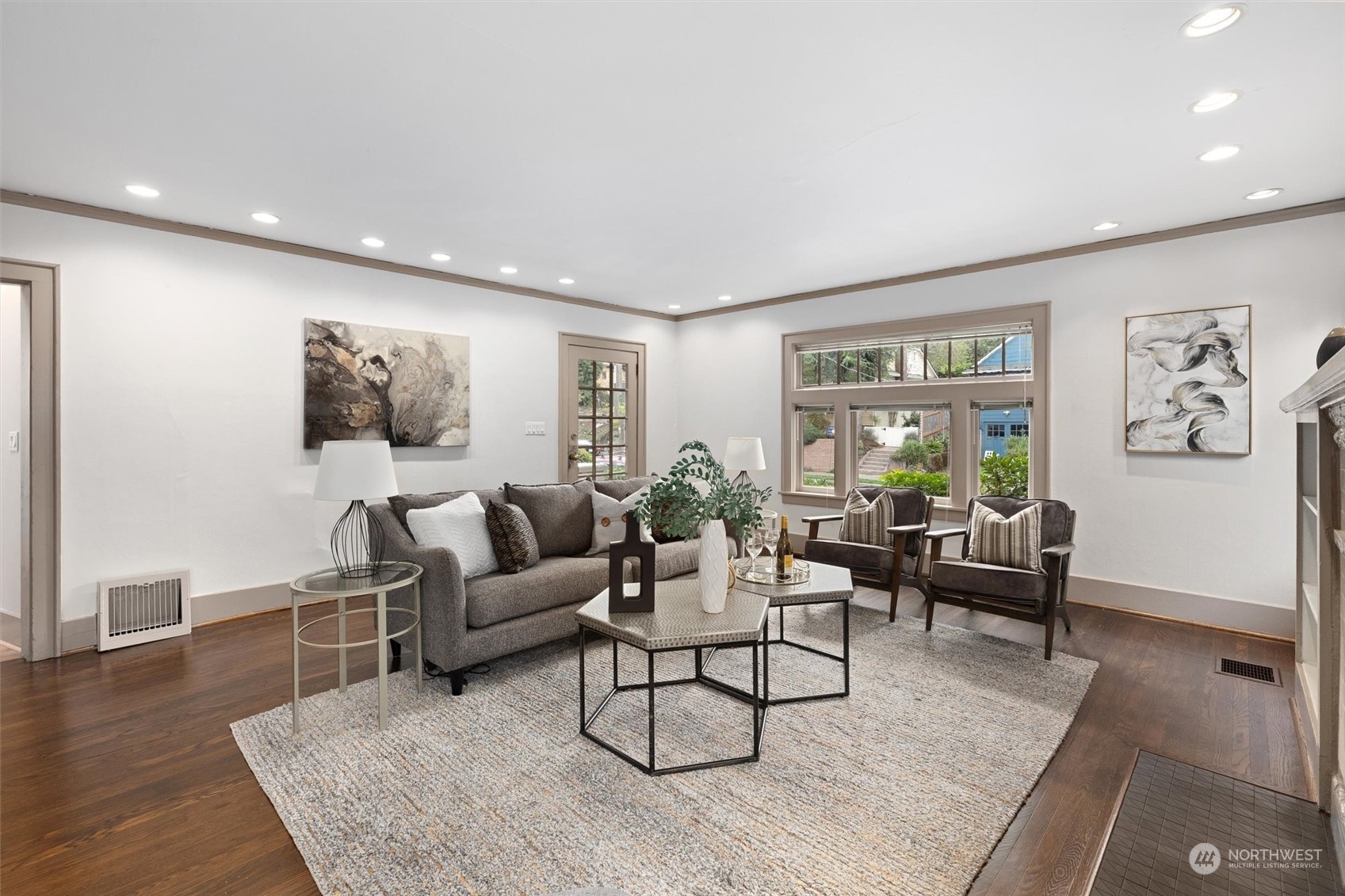 5916 8th Avenue Northeast Seattle, WA 98105 - Photo 6 of 40 a living room with furniture and a flat screen tv