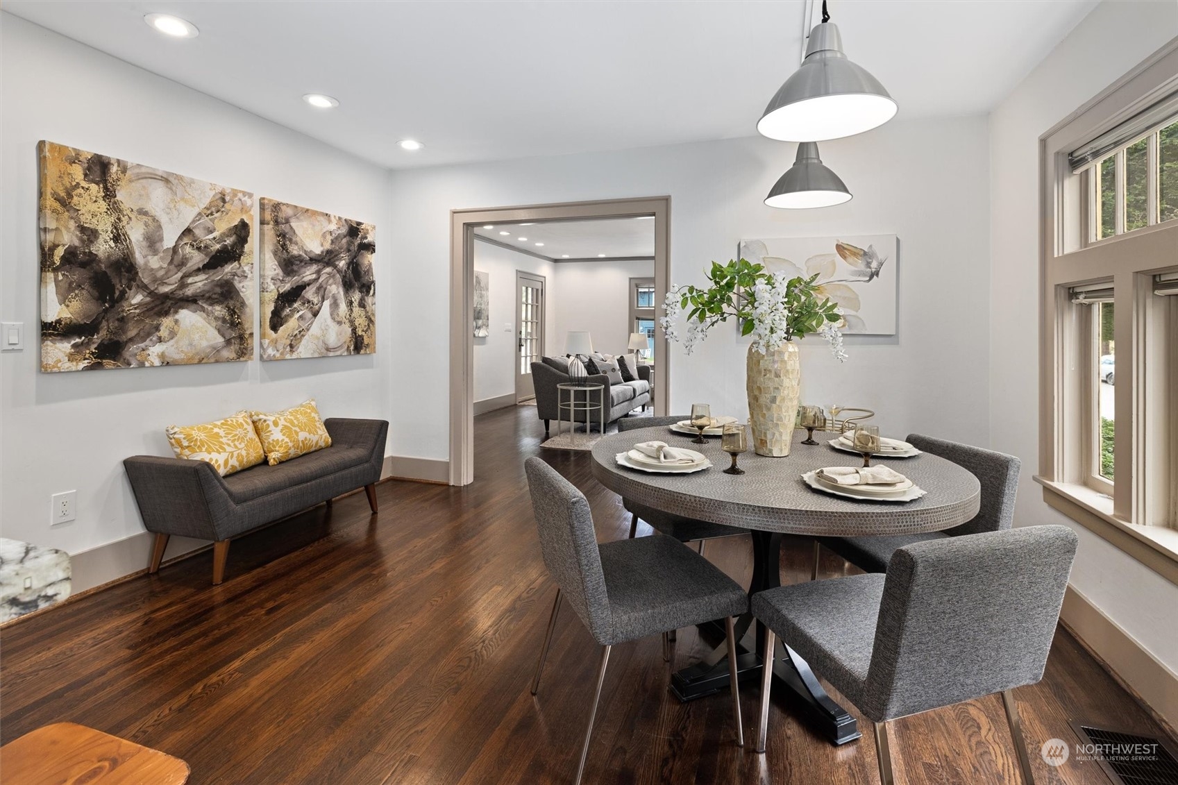 5916 8th Avenue Northeast Seattle, WA 98105 - Photo 7 of 40 a view of a dining room with furniture window and wooden floor
