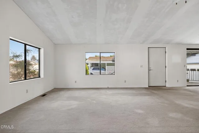 a view of a livingroom with a ceiling fan