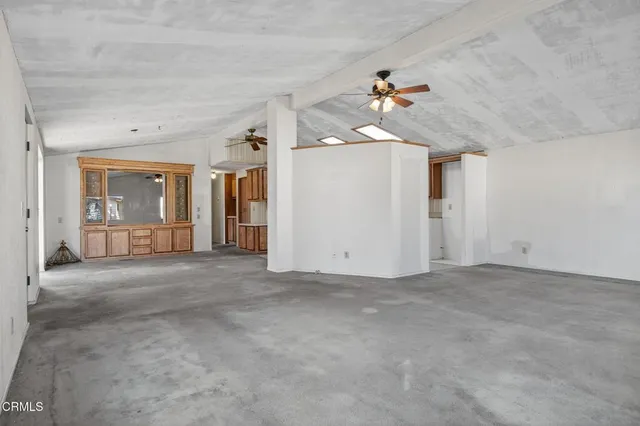 a view of a big room with closet and natural light