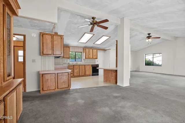 a bathroom with a sink and a window