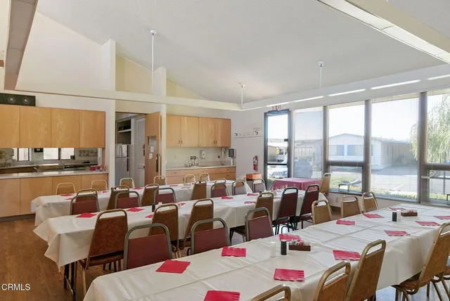 a view of swimming pool with an outdoor seating