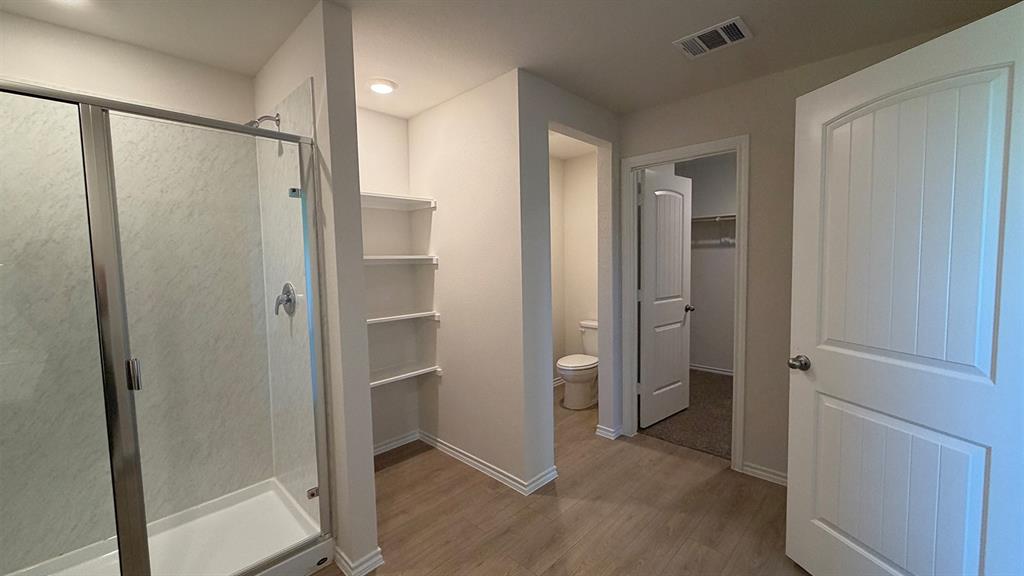 2007 Reveille Way Terrell, TX 75160 - Photo 23 of 31 a bathroom with a shower and a glass door