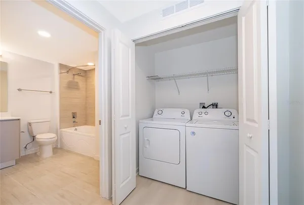 a view of bathroom with a sink and a toilet