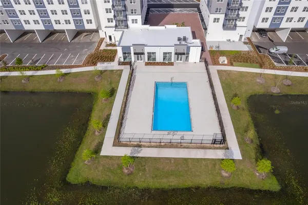 a view of yard with swimming pool