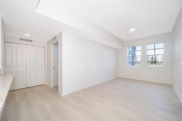 an empty room with windows