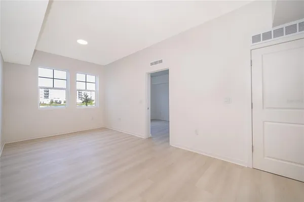 an empty room with windows