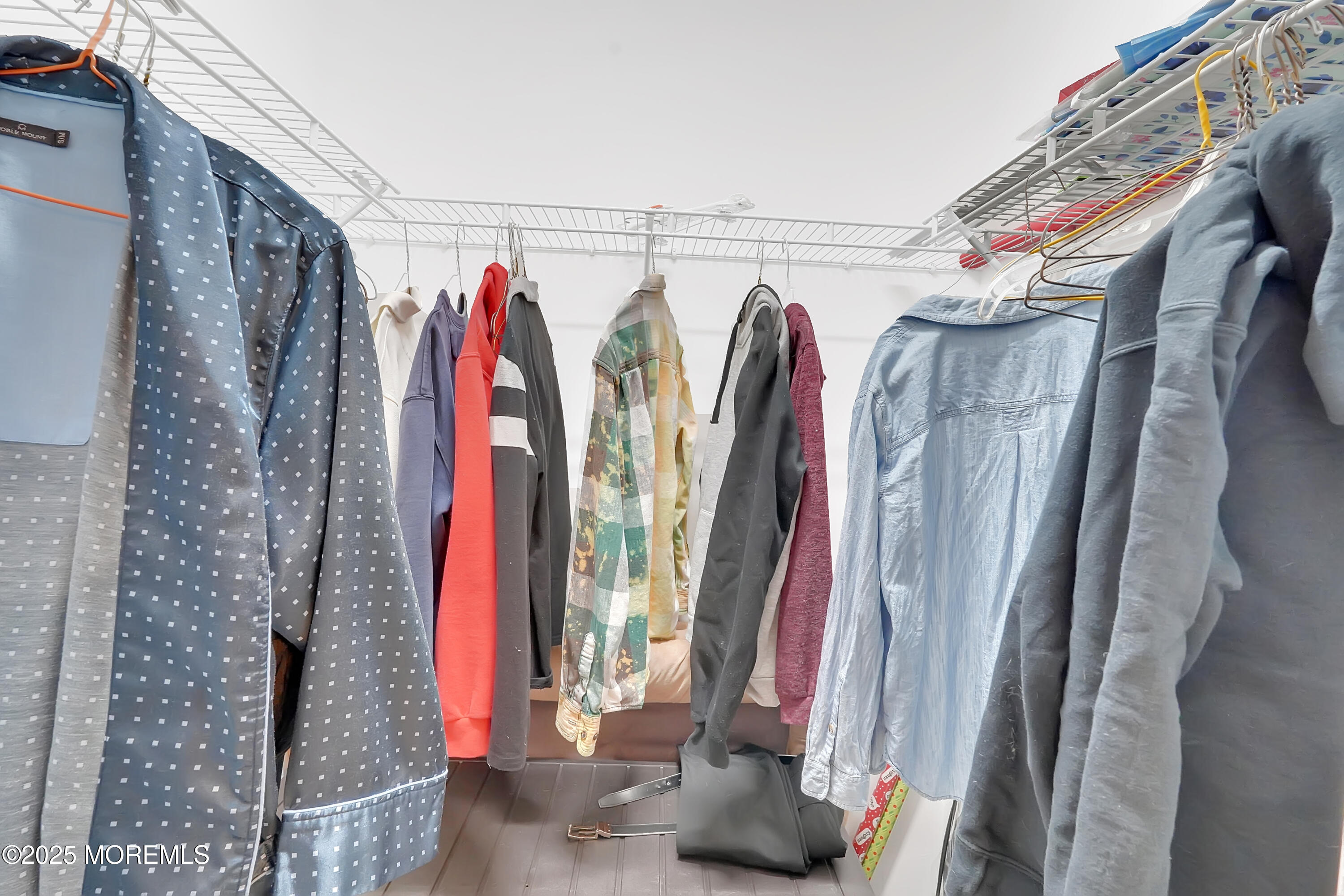 419 Coolidge Avenue Seaside Heights, NJ 08751 - Photo 14 of 82 a view of walk in closet with clothes