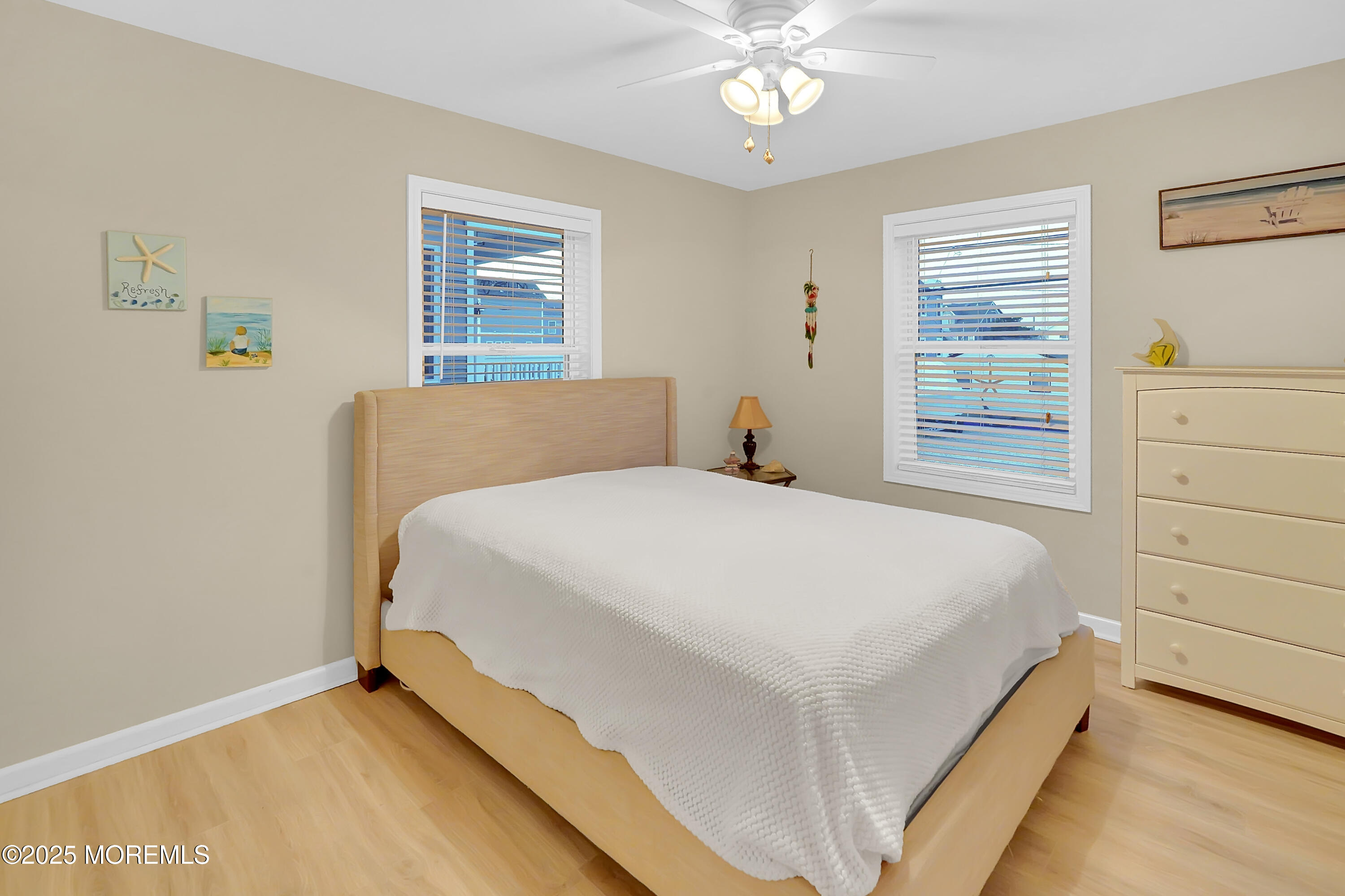 419 Coolidge Avenue Seaside Heights, NJ 08751 - Photo 17 of 82 a bedroom with a bed and a dresser