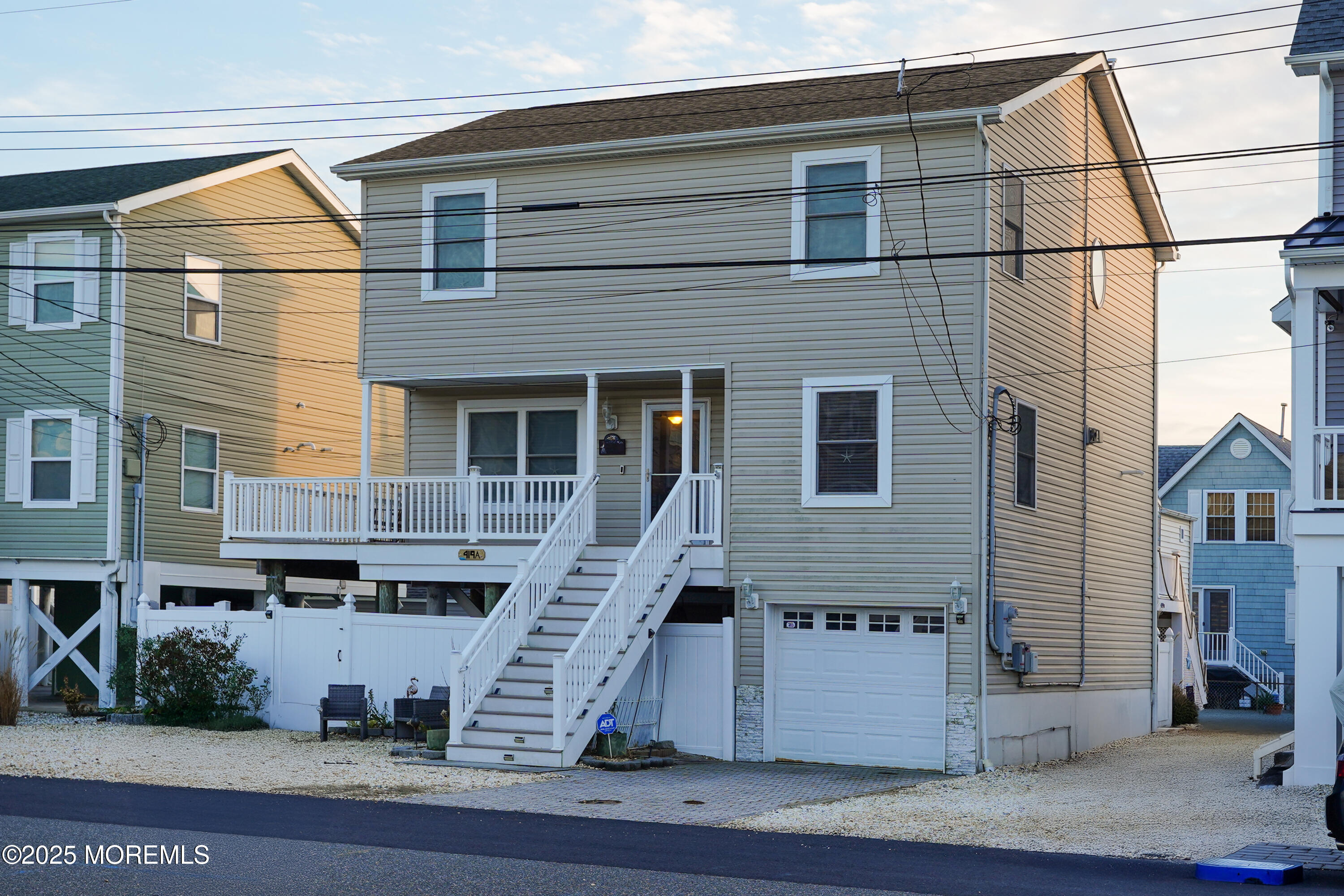 419 Coolidge Avenue Seaside Heights, NJ 08751 - Photo 45 of 82 a front view of a house with a garage
