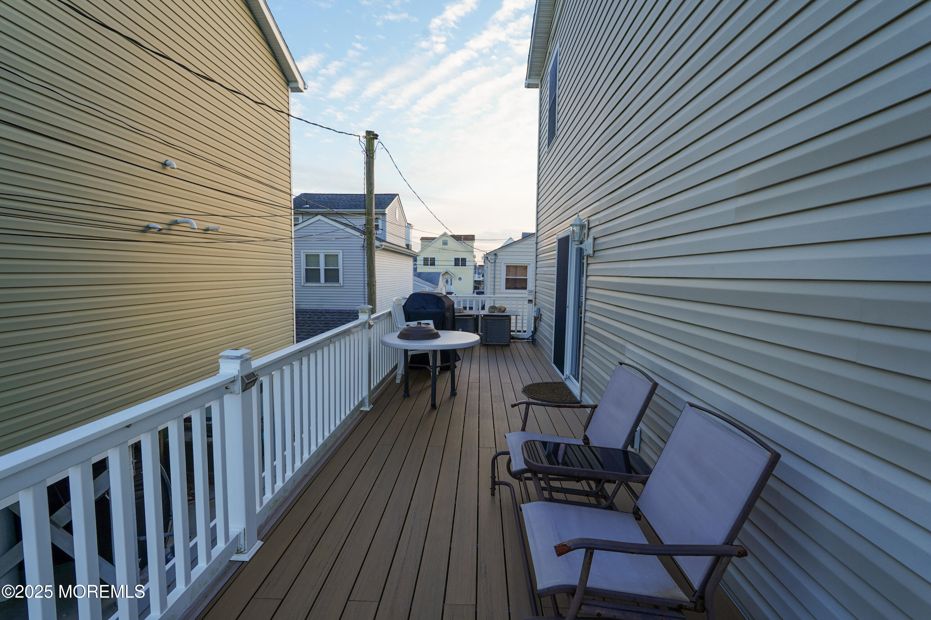 419 Coolidge Avenue Seaside Heights, NJ 08751 - Photo 71 of 82 a view of a chairs on the deck