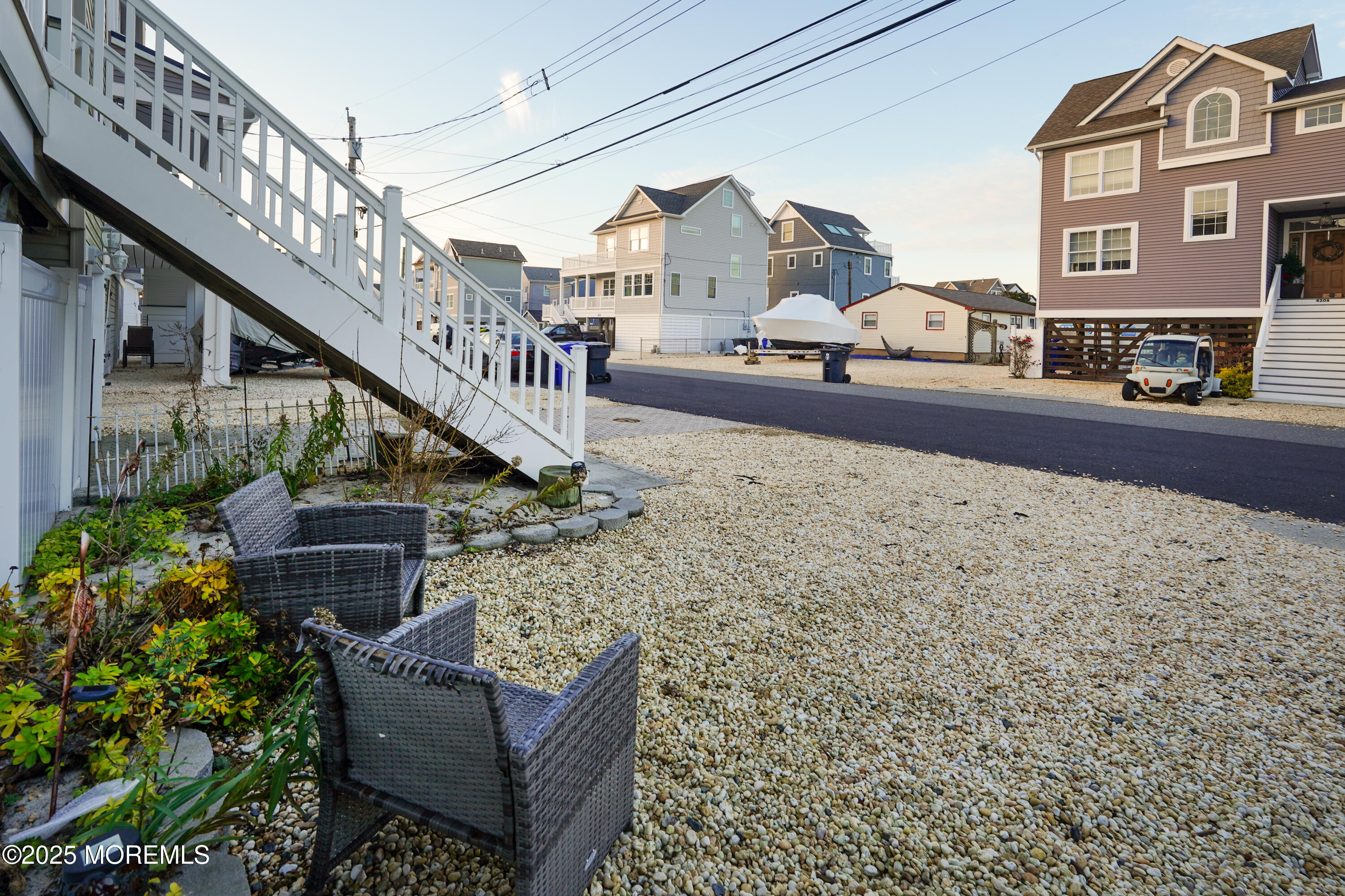 419 Coolidge Avenue Seaside Heights, NJ 08751 - Photo 72 of 82 a view of building with outdoor space and parking
