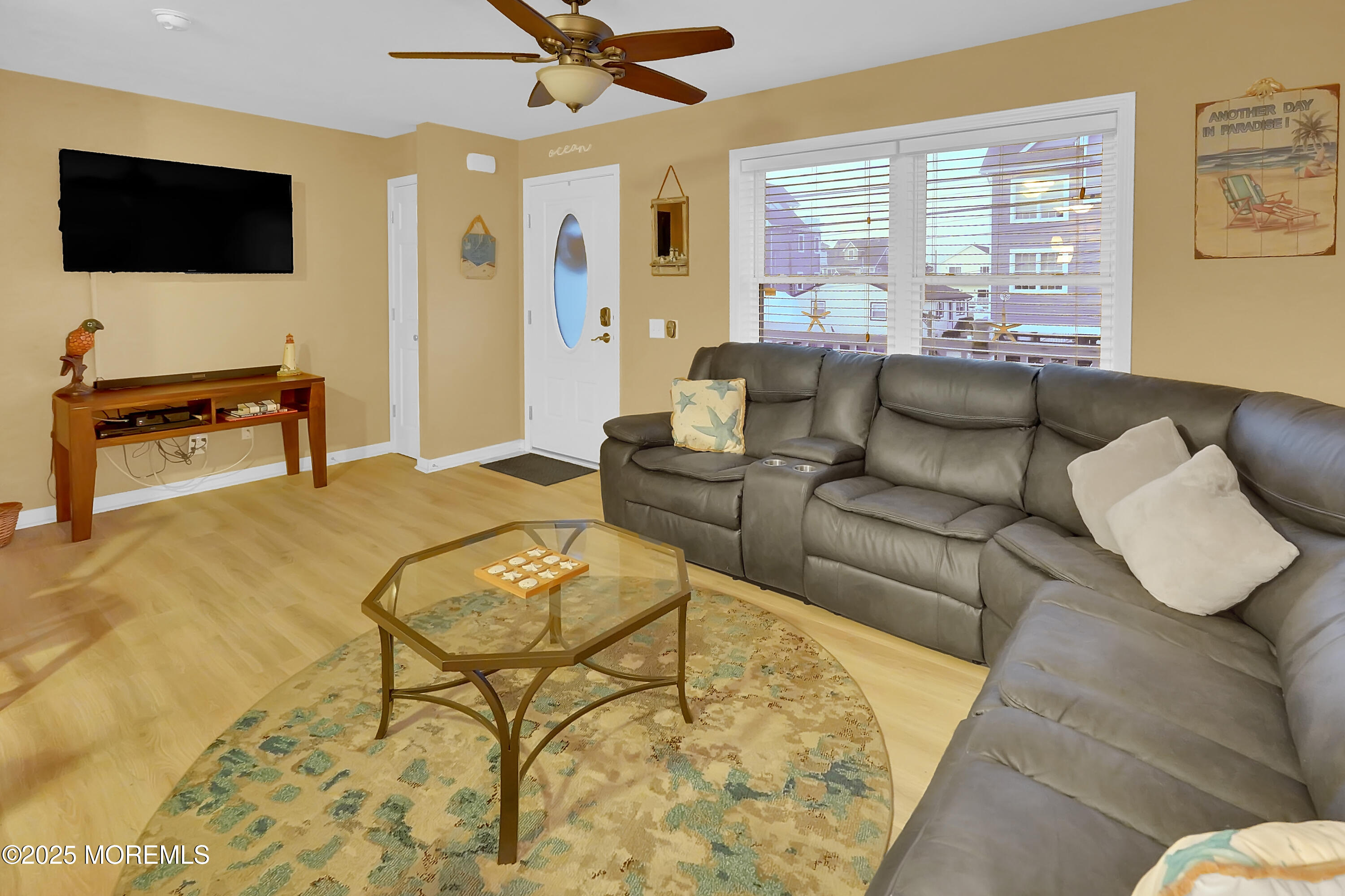 419 Coolidge Avenue Seaside Heights, NJ 08751 - Photo 79 of 82 a living room with furniture and a flat screen tv