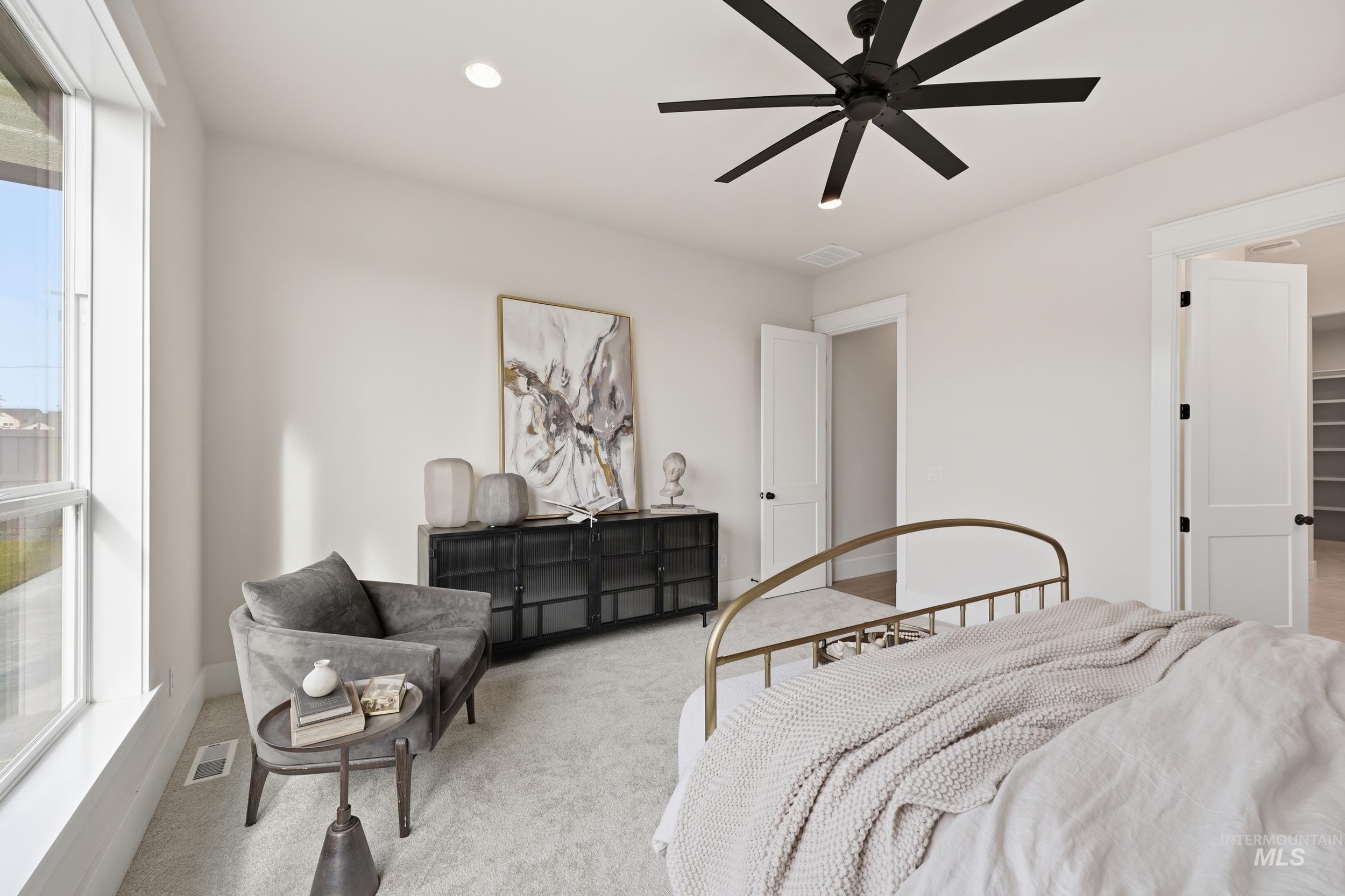 6513 South Utmost Way Meridian, ID 83642 - Photo 20 of 47 Carpeted bedroom with a ceiling fan