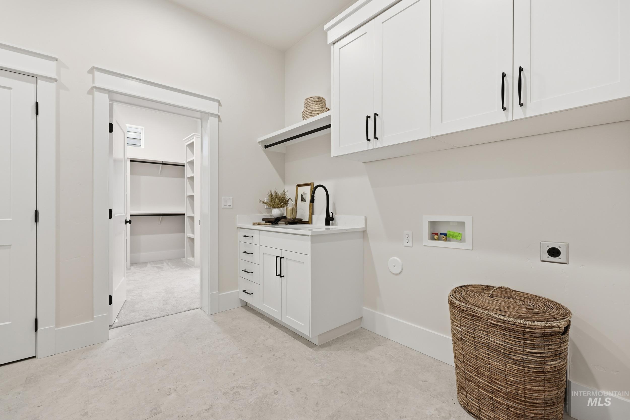 6513 South Utmost Way Meridian, ID 83642 - Photo 35 of 47 Washroom with washer hookup, electric dryer hookup, and cabinet space