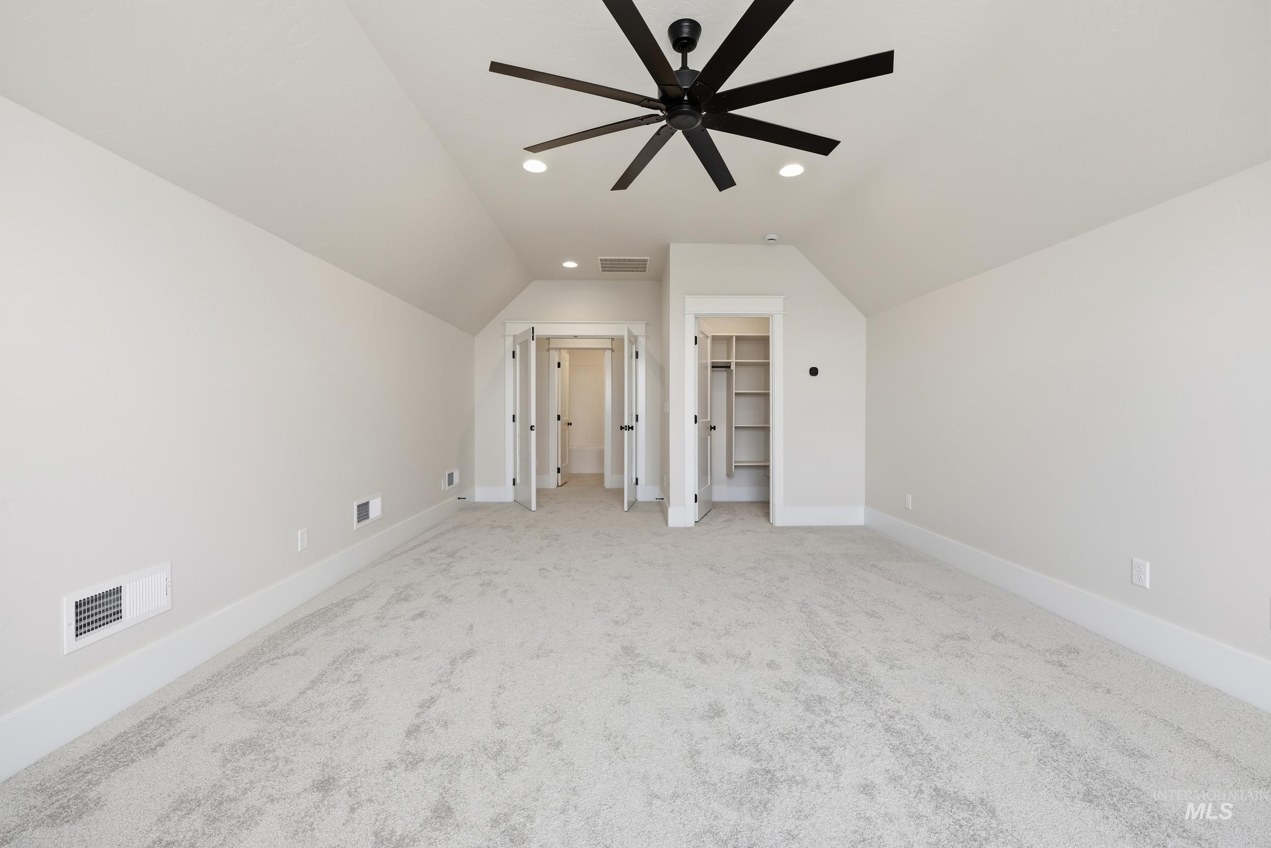 6513 South Utmost Way Meridian, ID 83642 - Photo 39 of 47 Additional living space with lofted ceiling, recessed lighting, ceiling fan, and light carpet