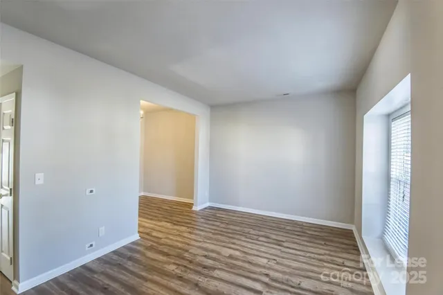 a view of an empty room and window