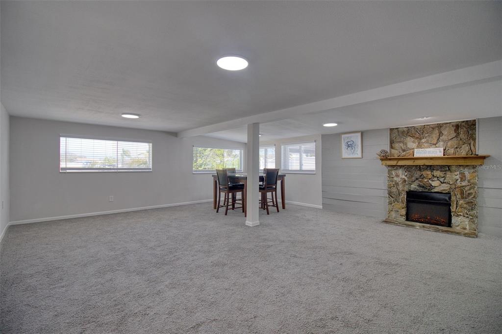 6820 Sea Ranch Drive Hudson, FL 34667 - Photo 5 of 29 a view of livingroom with furniture fireplace and window