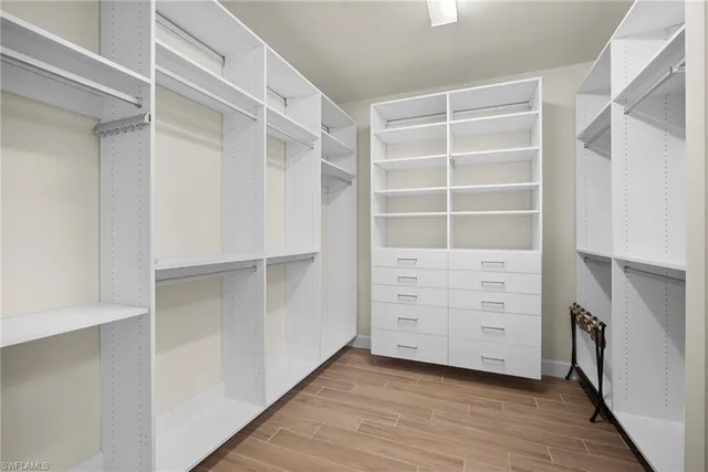 a view of an empty walk in closet