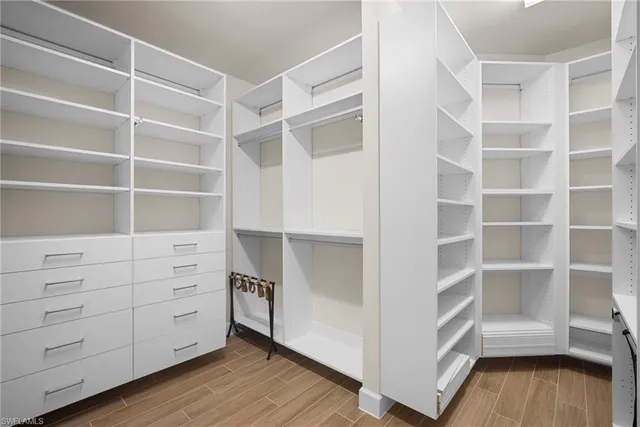 a view of an empty walk in closet