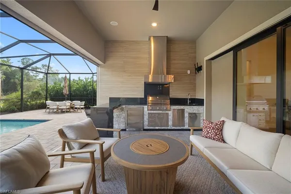 a living room with furniture and a table