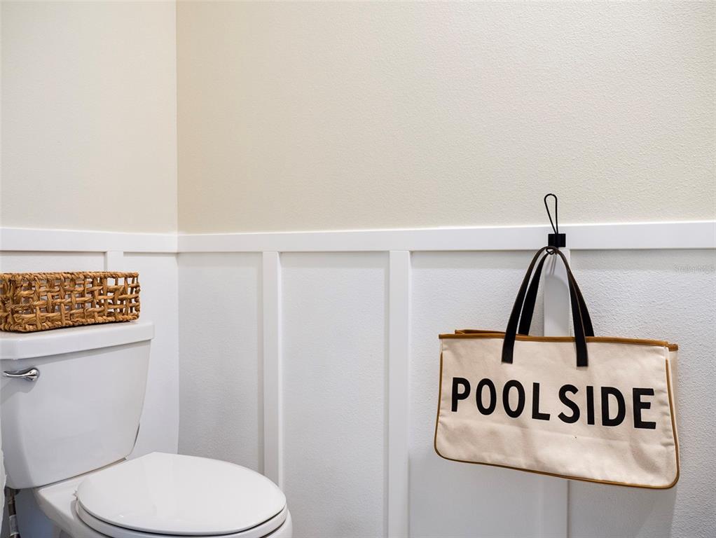 2949 Muller Oak Loop Ocoee, FL 34761 - Photo 15 of 36 a bathroom with a toilet and a view of bathroom