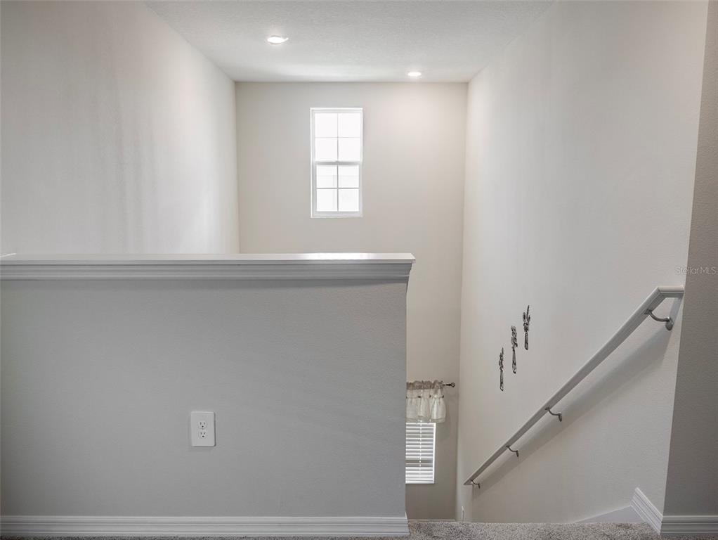 2949 Muller Oak Loop Ocoee, FL 34761 - Photo 17 of 36 a view of entryway with wooden floor