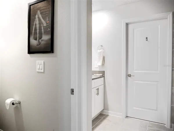 a view of a hallway with front door