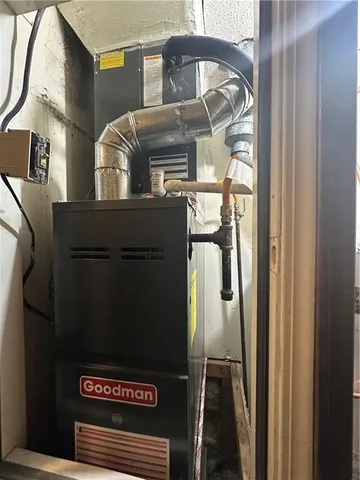 a bathroom with a shower and toilet