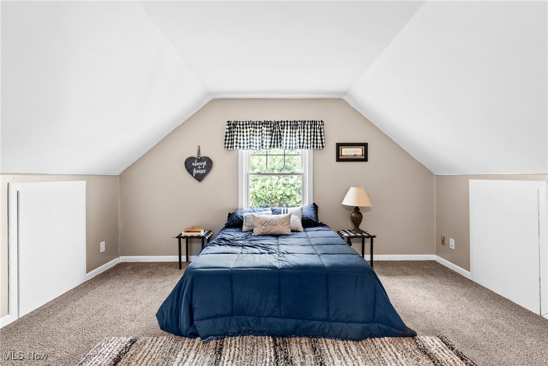 540 Park Road Painesville, OH 44077 - Photo 25 of 34 Bedroom featuring carpet and vaulted ceiling