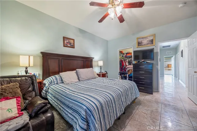 a large bathroom with a double vanity sink a mirror and a shower