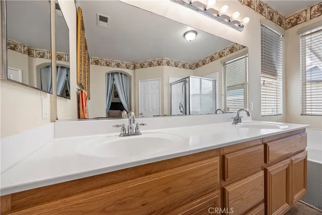 a white bath tub sitting next to a window
