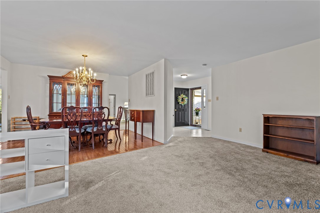 518 Rebel Ridge Road Colonial Heights, VA 23834 - Photo 27 of 44 an empty room with furniture and windows
