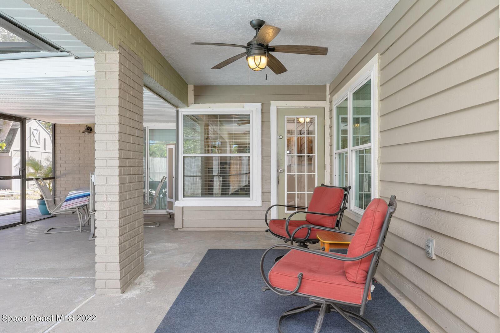 6385 Banks Avenue Cocoa, FL 32927 - Photo 16 of 47 a balcony with table and chairs