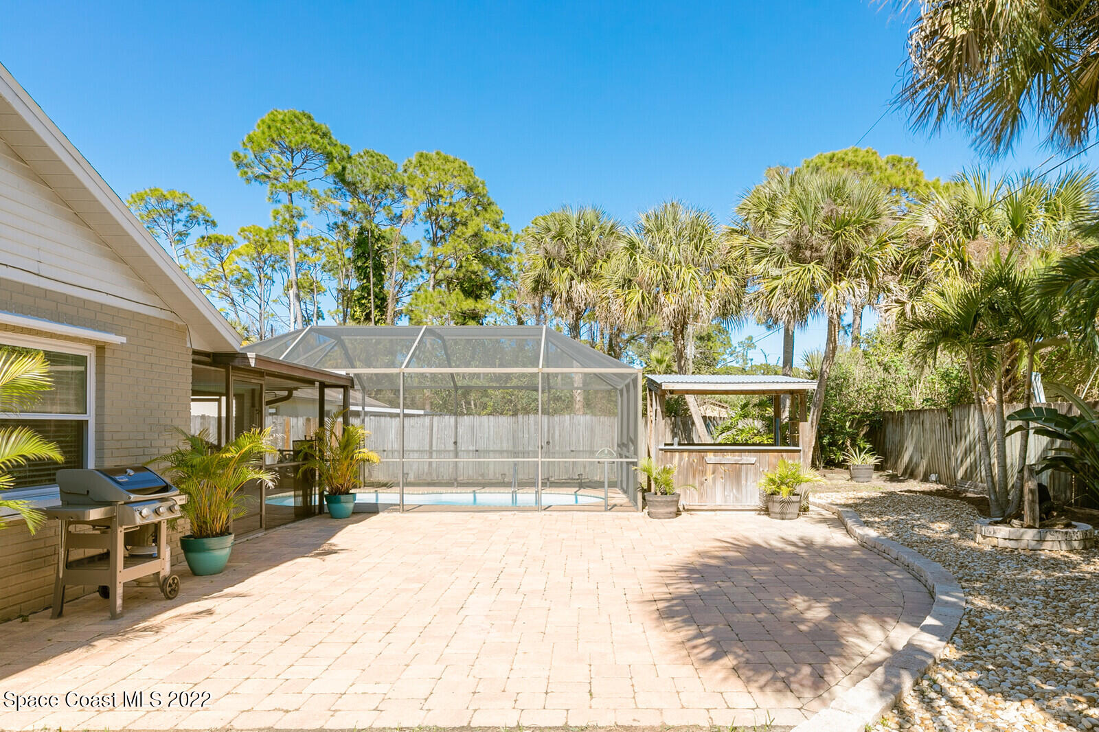 6385 Banks Avenue Cocoa, FL 32927 - Photo 20 of 47 a view of a swimming pool with a patio