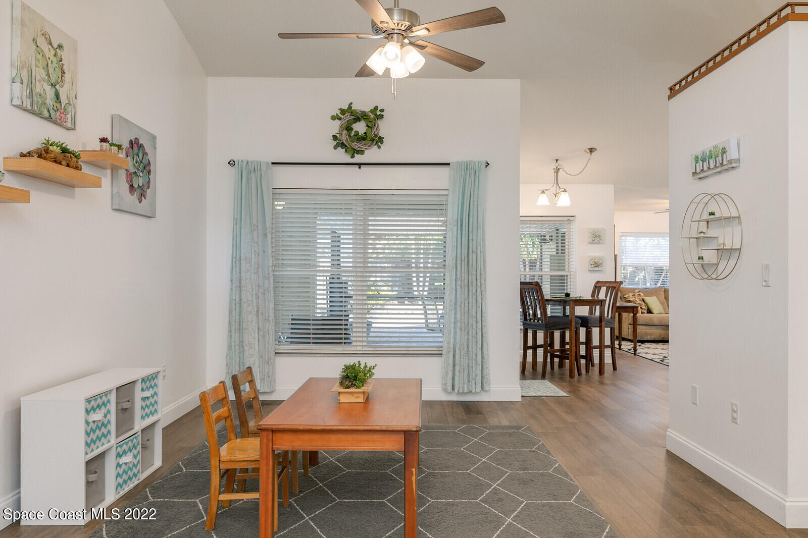 6385 Banks Avenue Cocoa, FL 32927 - Photo 28 of 47 a view of a dining room with furniture and chandelier