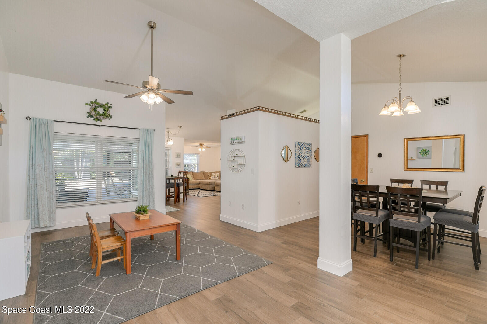 6385 Banks Avenue Cocoa, FL 32927 - Photo 3 of 47 a living room with furniture and a table