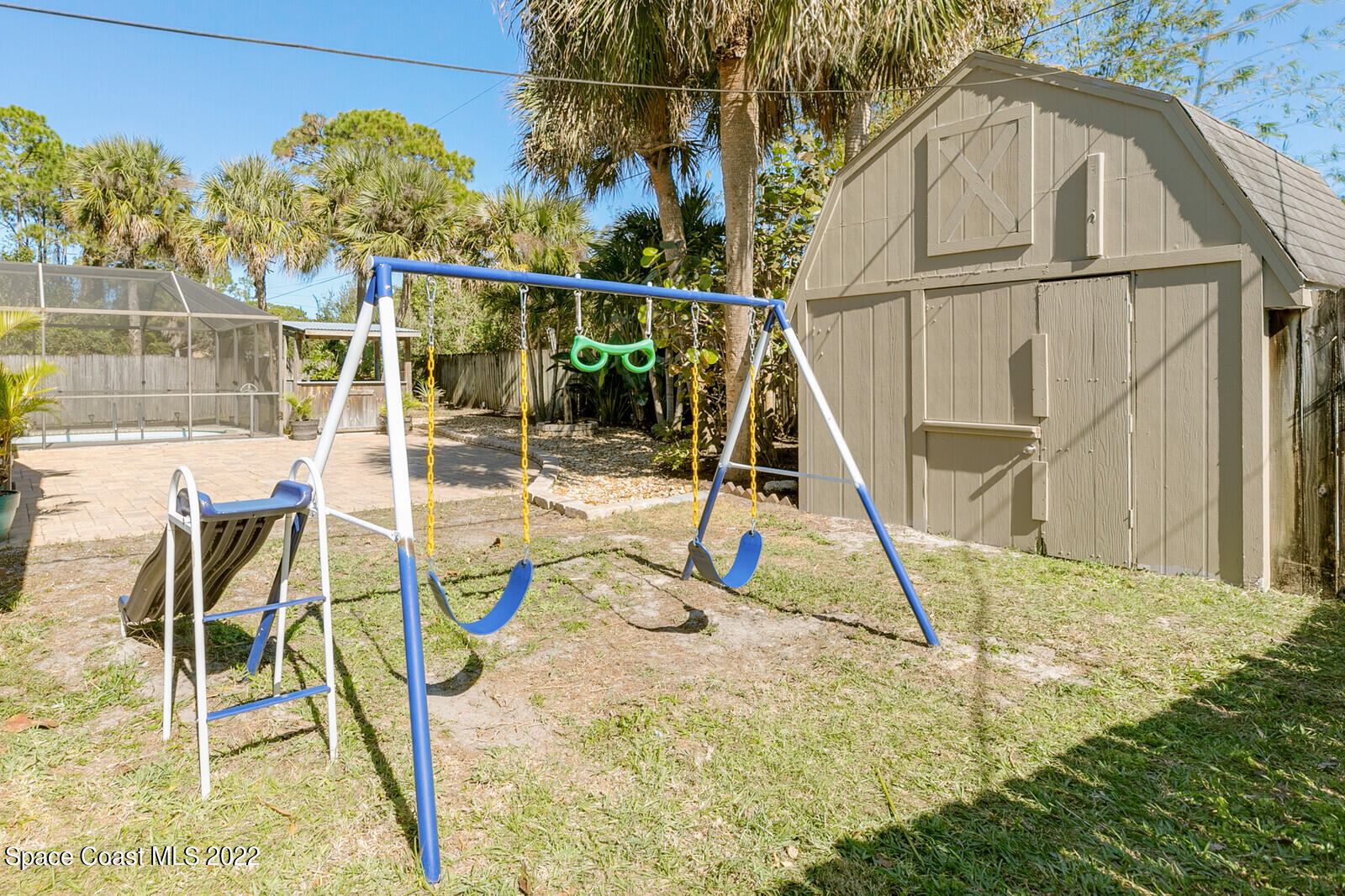 6385 Banks Avenue Cocoa, FL 32927 - Photo 35 of 47 a view of a swimming pool with a patio