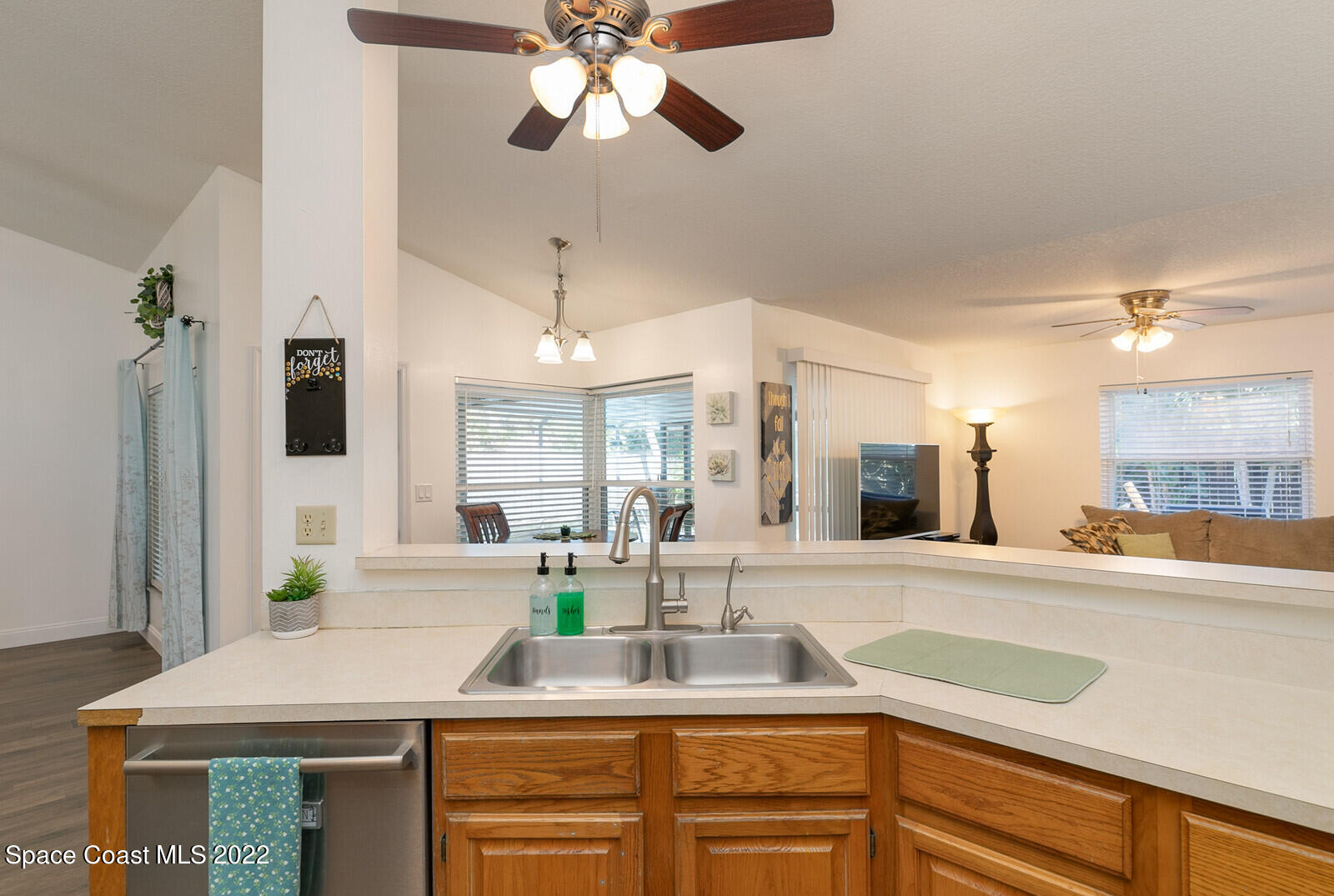 6385 Banks Avenue Cocoa, FL 32927 - Photo 42 of 47 a kitchen with a sink cabinets and window