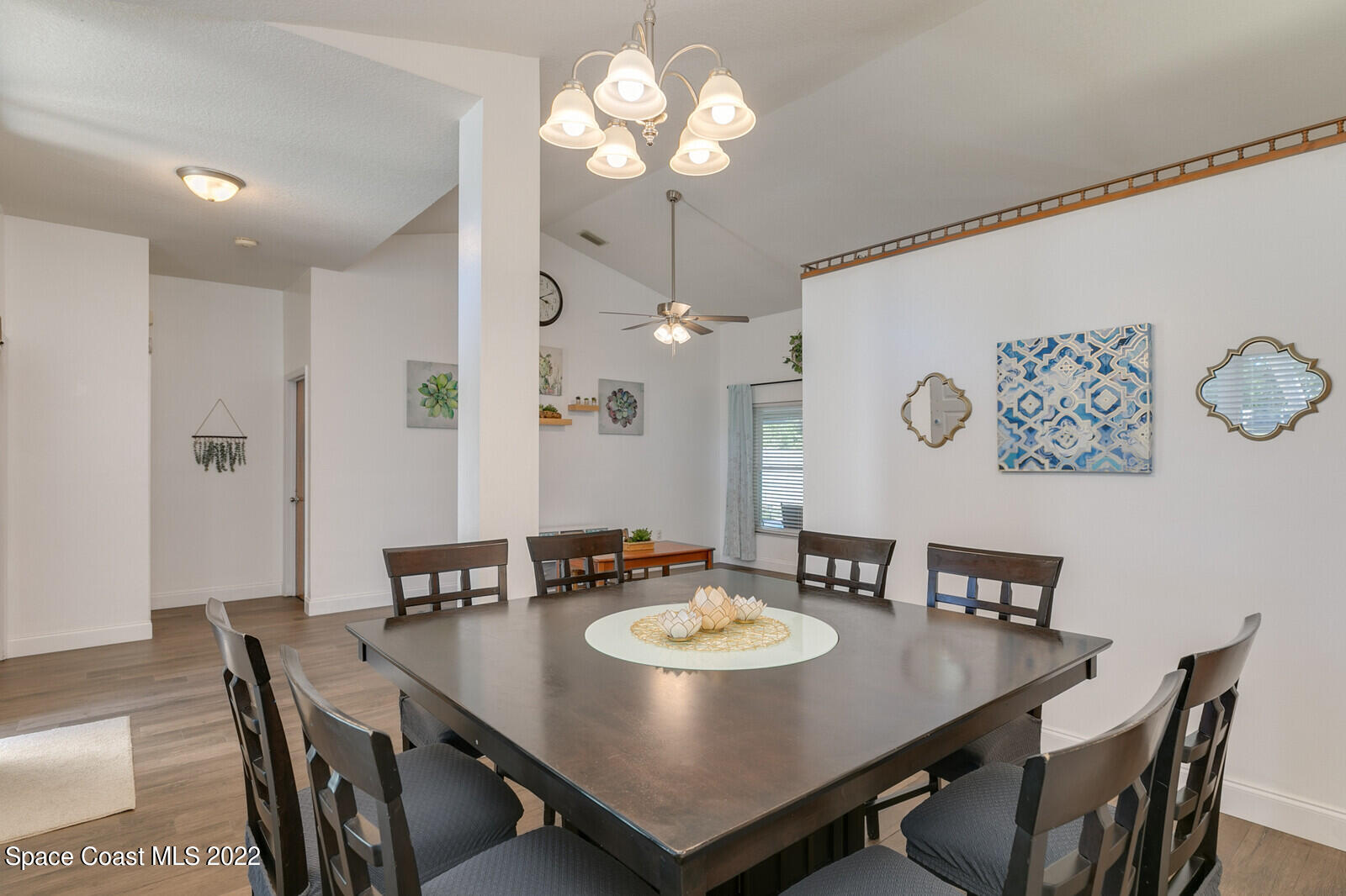 6385 Banks Avenue Cocoa, FL 32927 - Photo 5 of 47 a view of a dining room with furniture and a chandelier