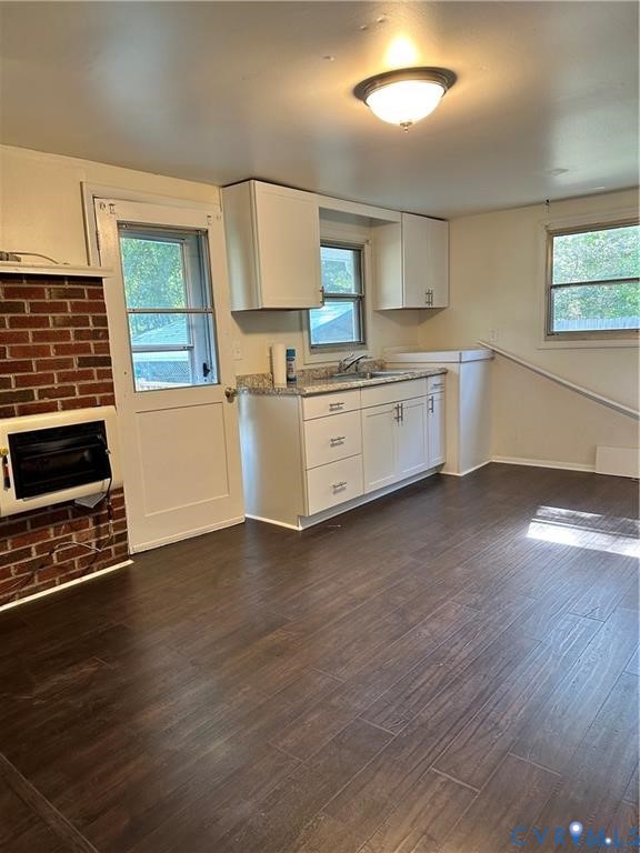 15817 Gatewood Road Dinwiddie, VA 23841 - Photo 2 of 4 Updated kitchen area featuring white cabinetry, st