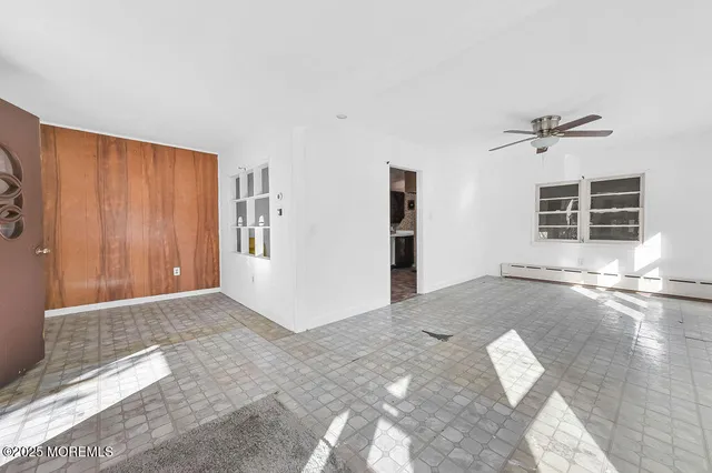 a view of a livingroom with a staircase