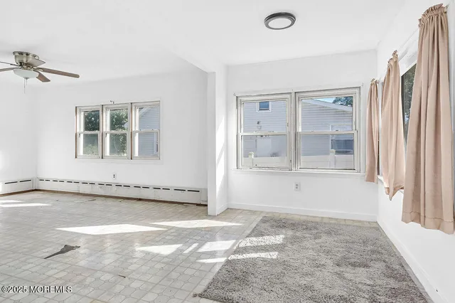 an empty room with windows