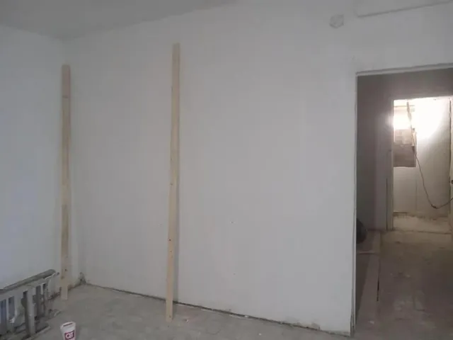 a view of hallway with a small space