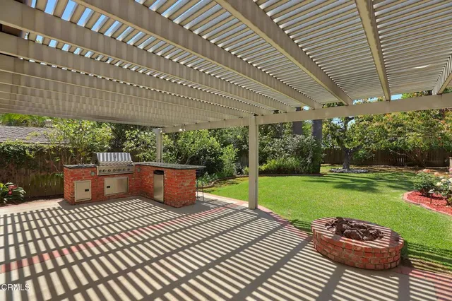 a view of a park with large trees