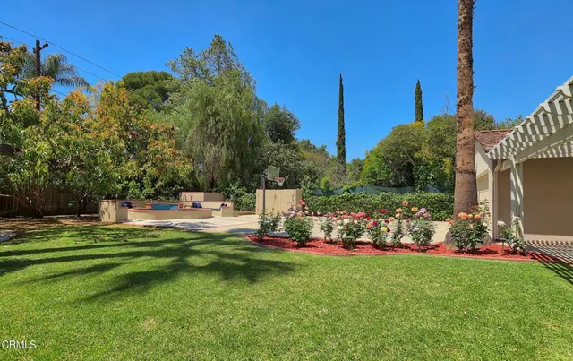 front view of a house with a big yard