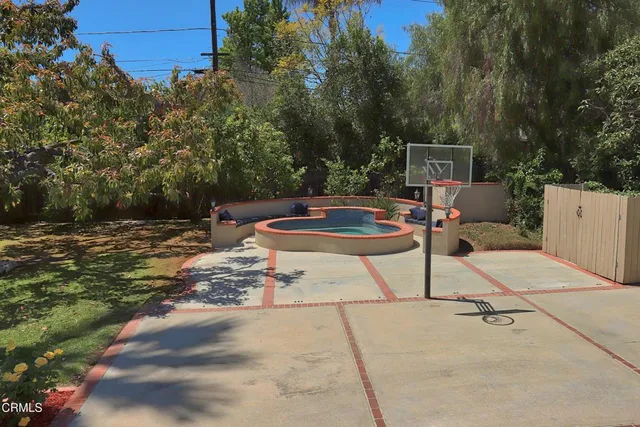 a backyard of a house with lots of green space