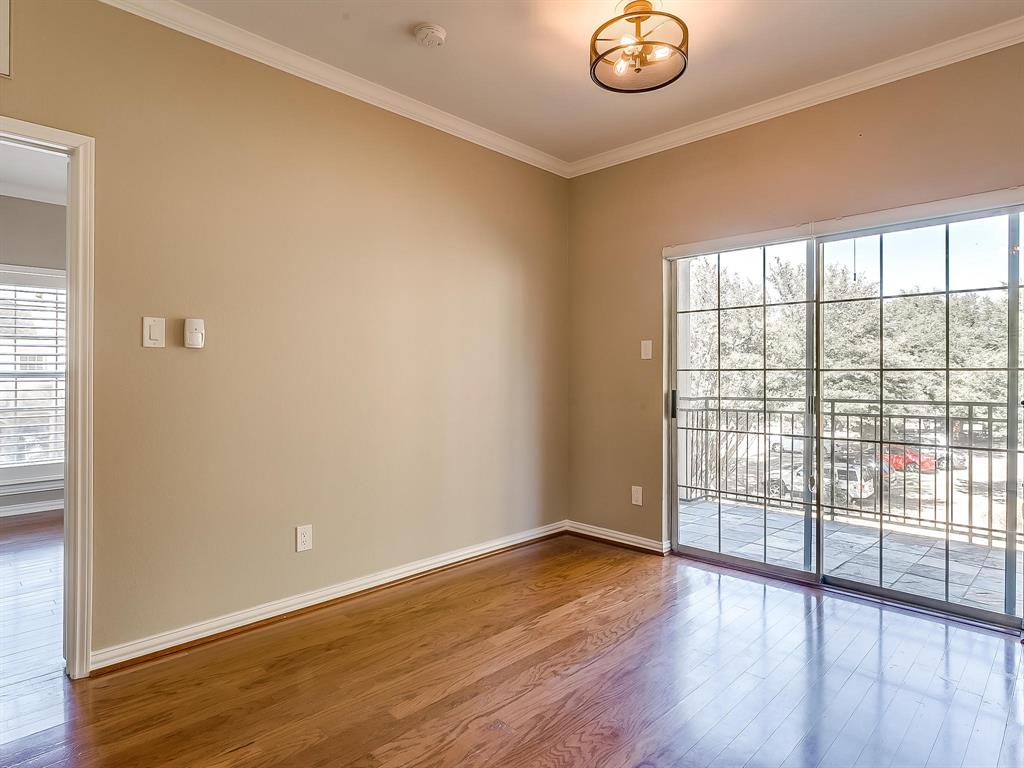 2524 Preston Road, Unit 1303 Plano, TX 75093 - Photo 11 of 28 an empty room with wooden floor and windows