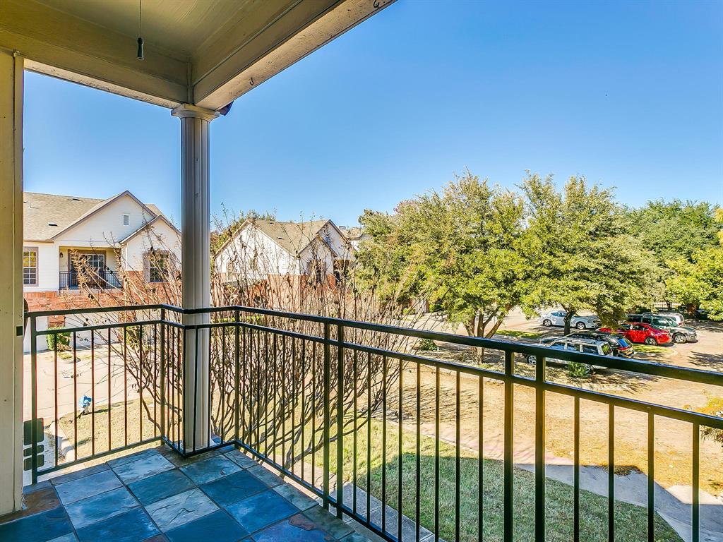 2524 Preston Road, Unit 1303 Plano, TX 75093 - Photo 26 of 28 a view of balcony with wooden floor and fence