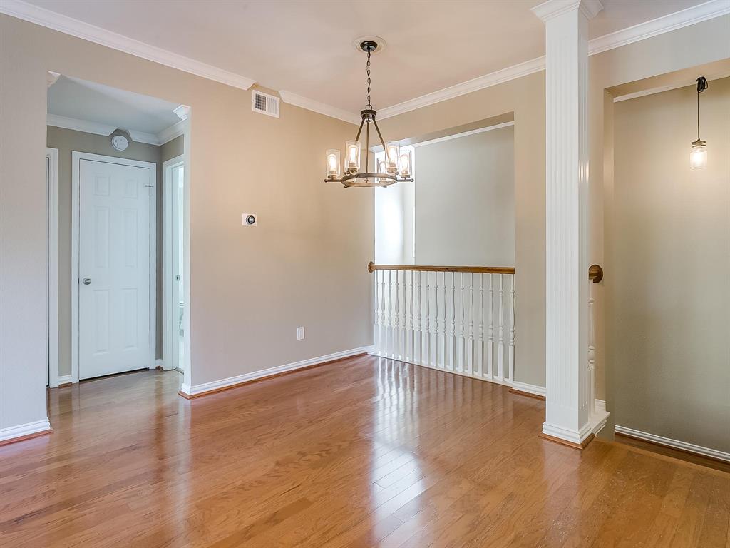 2524 Preston Road, Unit 1303 Plano, TX 75093 - Photo 4 of 28 wooden floor in an empty room with a window